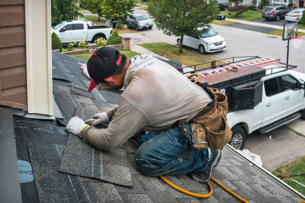 Professional Roof Leak Repair technician working in New Hyde Park, NY